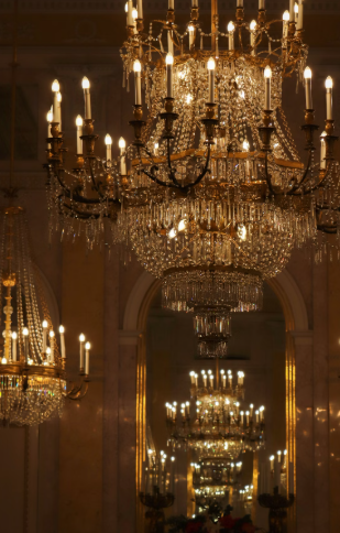 A grand chandelier adding elegance and warmth to the room.